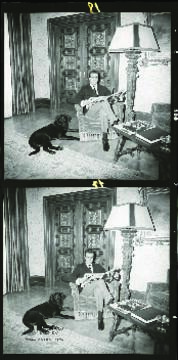 El príncipe Juan Carlos posa sentado leyendo la prensa en compañía de su perro, en un salón del P...